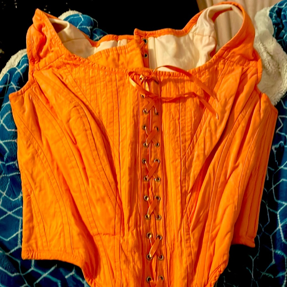Bright orange steel bone corset